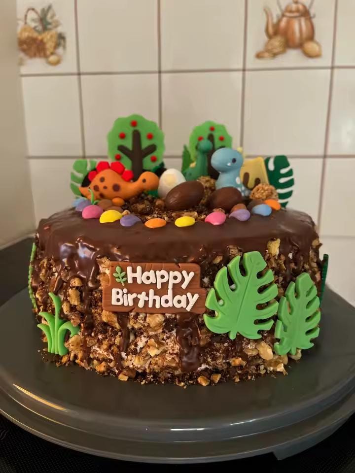 24-Piece Dinosaur Cake Topper, Safari Jungle Birthday Decor, T-Rex Volcano Leaves Kit